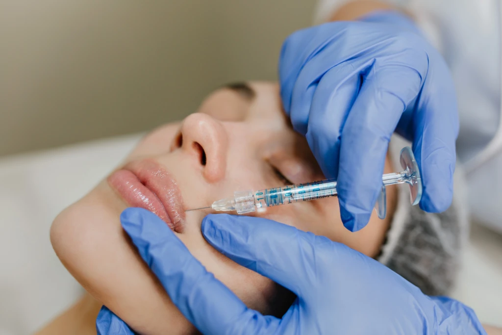 woman-receiving-cosmetic-injection-for-lip-enhance-2026-03-09-06-51-41-utc